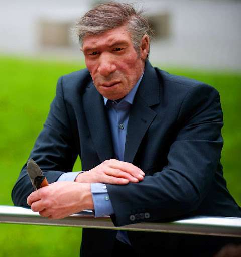neanderthal man in a suit lol